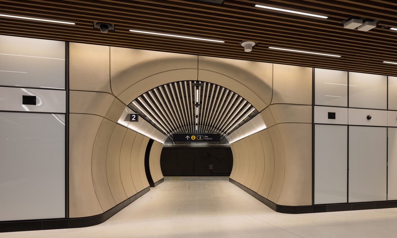 The newly opened Karanga-a-Hape Station features distinctive curved tunnel designs and slatted batten ceilings.