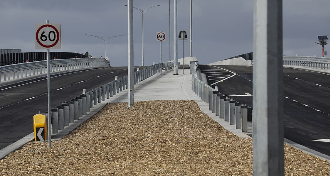 The new bridge is part of the Victorian Government’s program to remove level crossings to create better road and rail connections, ease congestion.