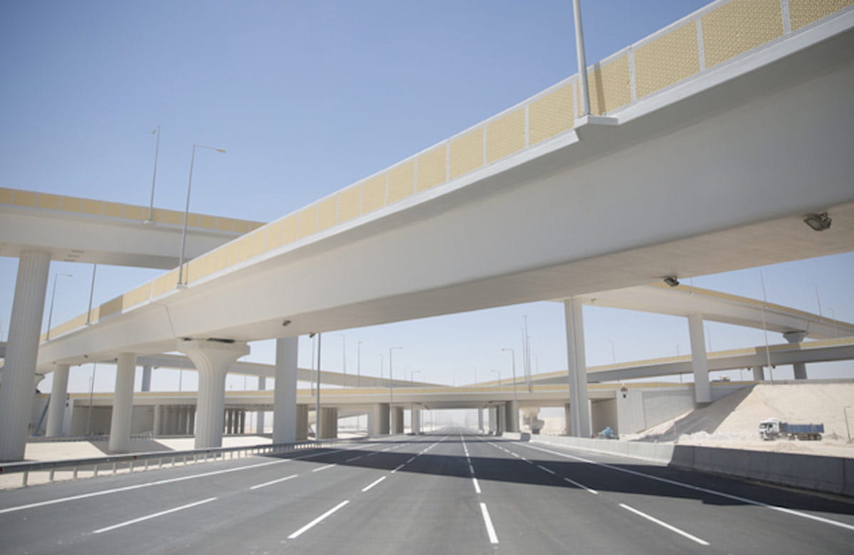 The G-Ring Road Project at the 4-level free flow Umm Besher Systems Interchange. Image courtesy of Public Works Authority, Ashghal. Credit KBR as the PMC.