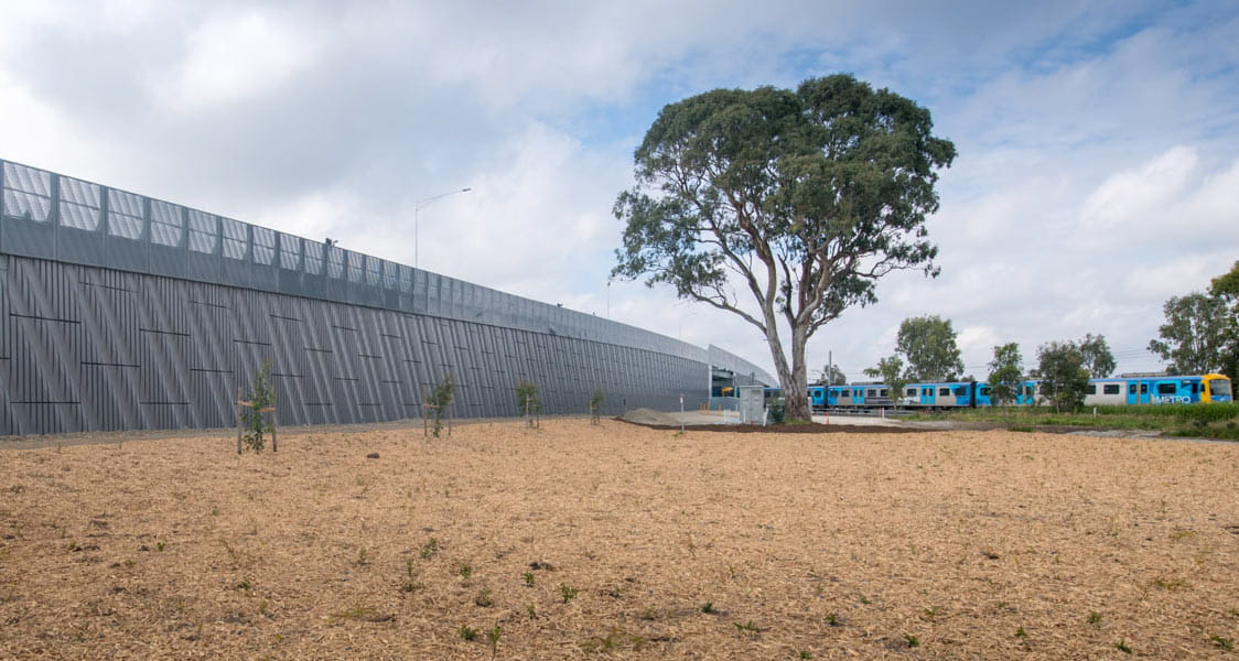 To minimise the footprint of the embankments, reinforced soil retaining walls were constructed along one side.