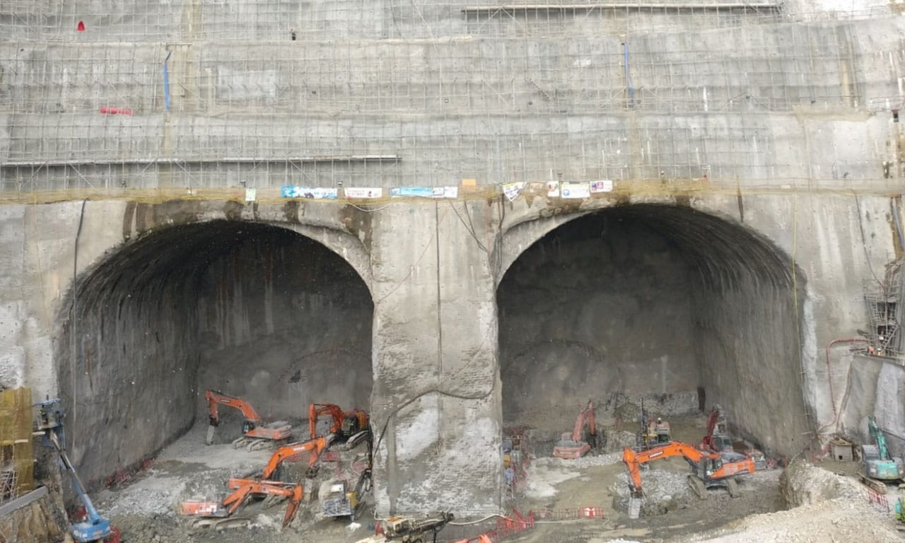 The drill and blast excavation for the new TKO Lam Tin Tunnel navigating through Hong Kong, the fourth most densely populated country in the world.