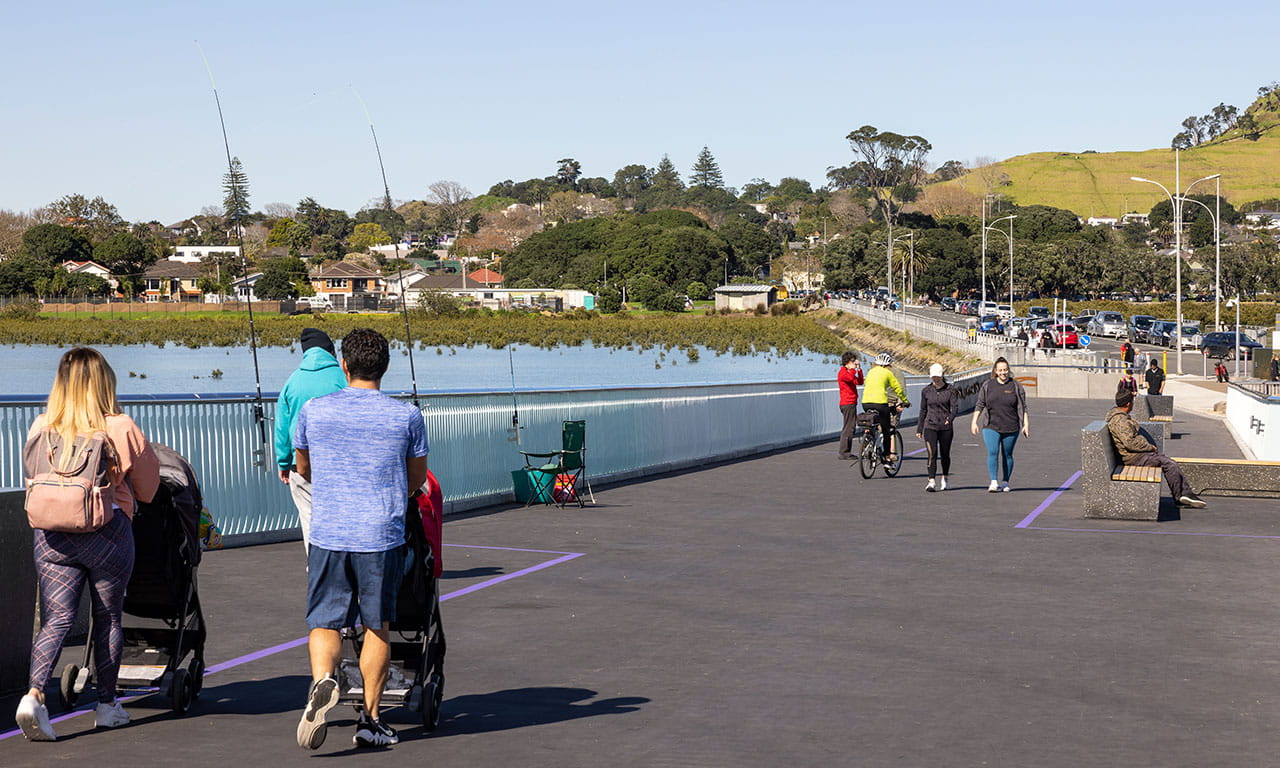  Ngā Hau Māngere bridge’s intent is both a strategic physical connection and a place for the community. Image courtesy of Mark Scowen Photography.