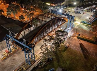 A brand-new steel arch bridge was successfully installed across James Ruse Drive in Rosehill in May 2021 as part of the Parramatta Light Rail project.