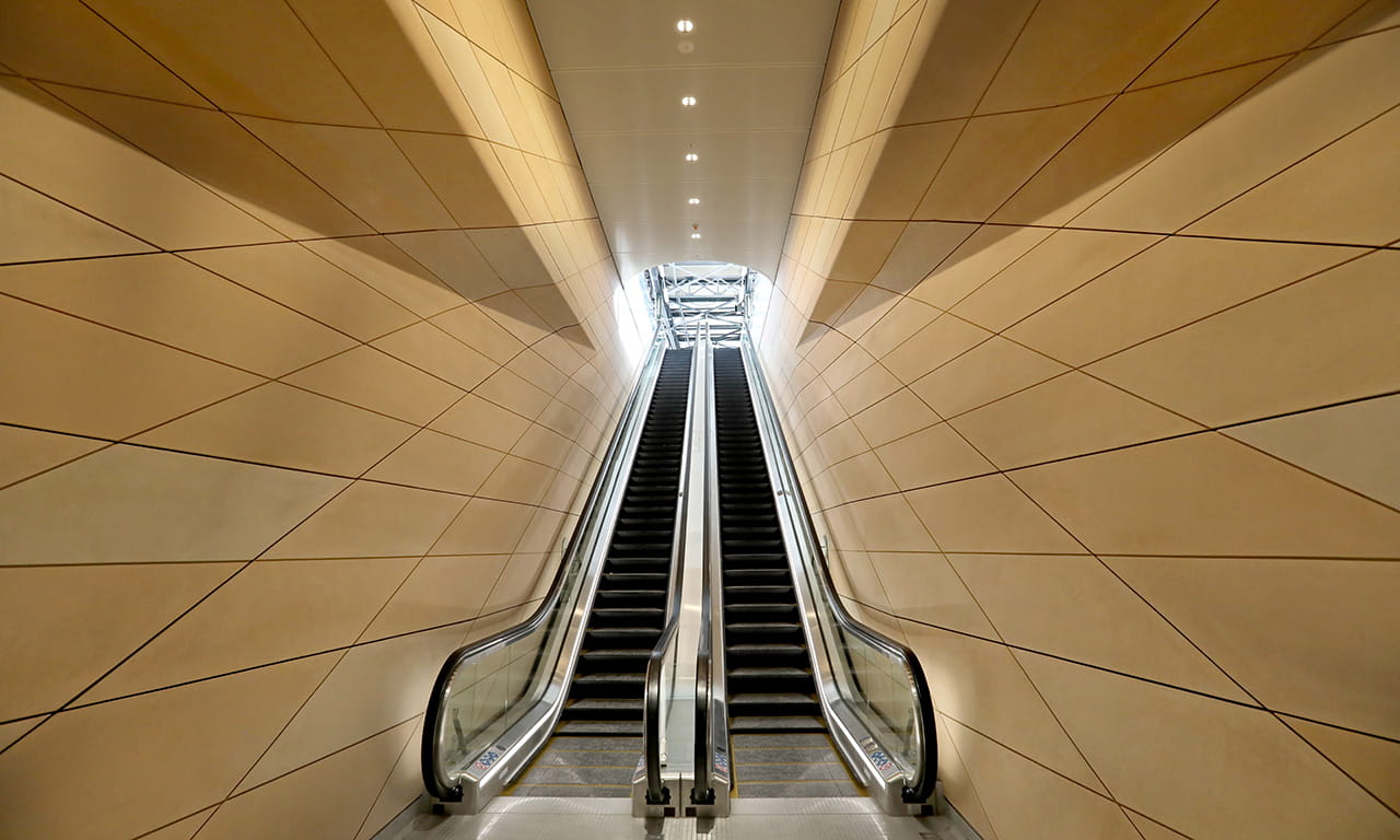 Escalators at Sydney Metro Central Station Central Walk, directly to suburban platforms 16 to 23 – for the first time in the station’s history – located 2 metres below the tracks of platforms operating 20 hours/day, 365 days/year. Image courtesy of Sydney Metro.