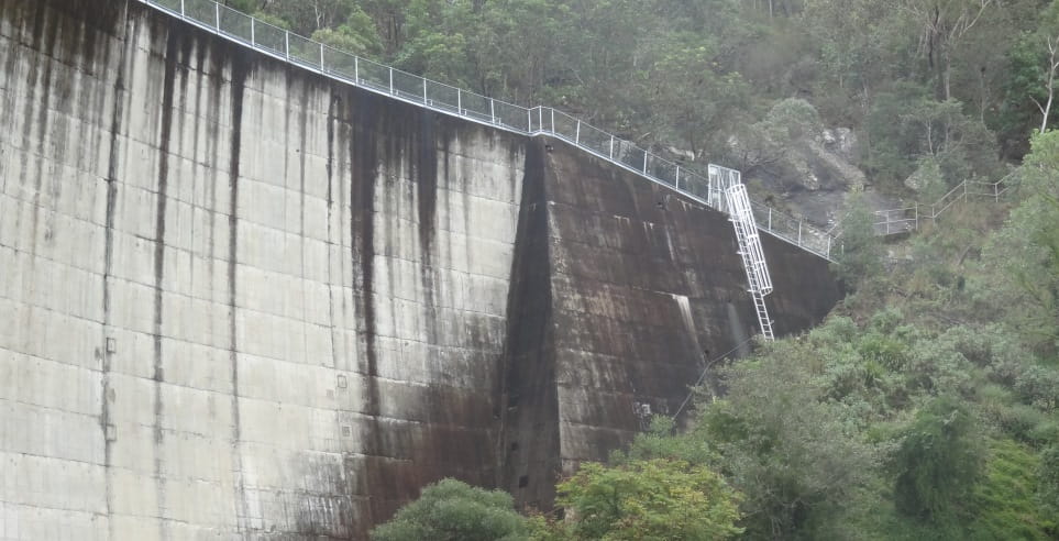 Looking from the ground up at the Moogerah Dam wall.