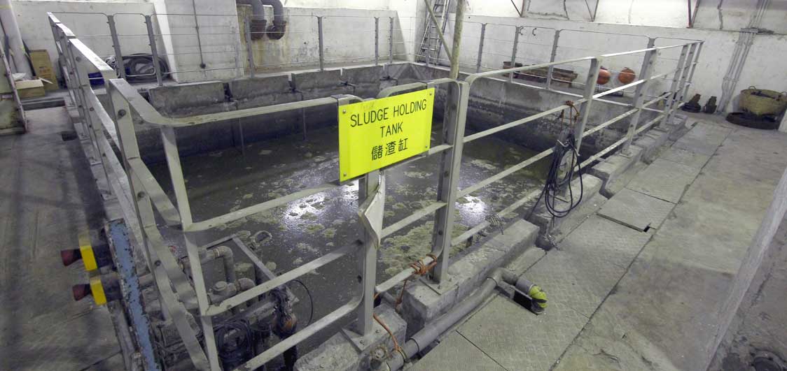 Sludge holding tank treatment used to manage and dispose of sewage sludge produced during sewage treatment.