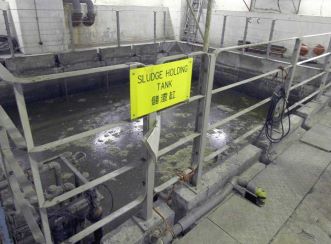 Sludge holding tank treatment used to manage and dispose of sewage sludge produced during sewage treatment.